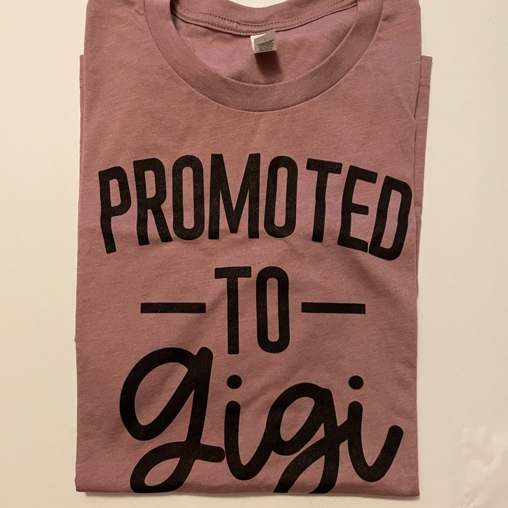 Proud grandparent T-shirt brand new. Promoted to Gigi